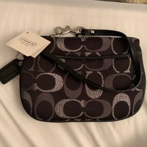 Brand: Coach Black and Silver Wristlist, Color: Black and Silver, Never used!